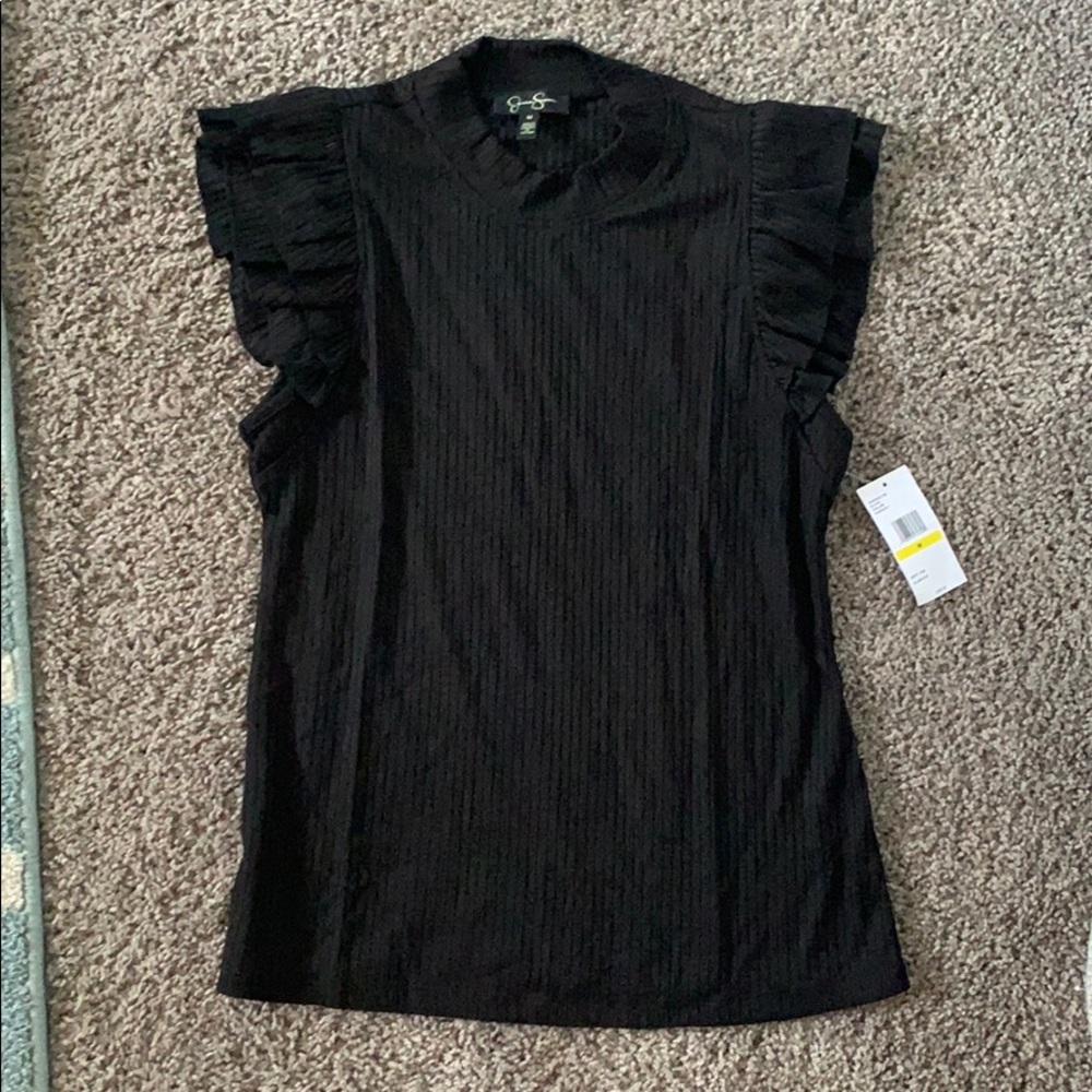 Black sleeveless turtleneck with ruffles